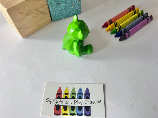 A geometric 3D crayon shaped like a sitting teddy bear