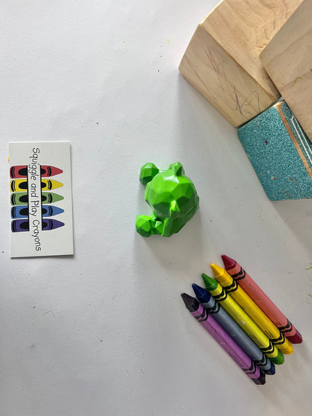 A geometric 3D crayon shaped like a sitting teddy bear