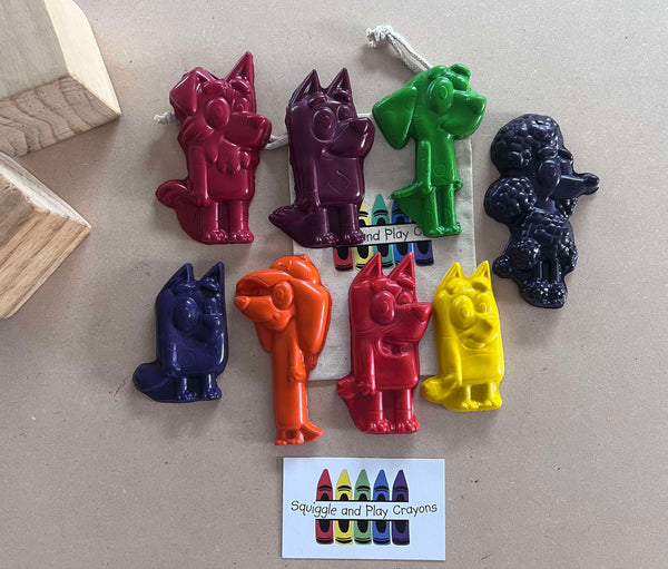 8 different coloured standing puppy dog crayons. 