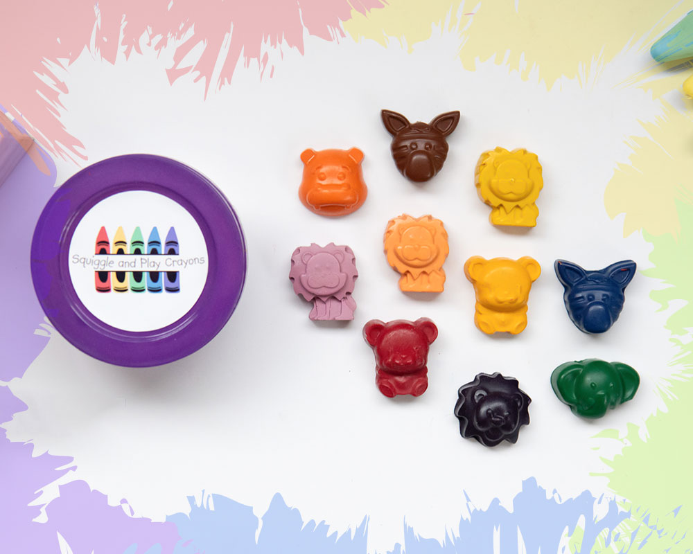 a round tub with a purple lid and an assortment of cartoon wild animal crayons