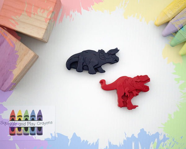 2 large, realistic-looking 2D dinosaur crayons: a triceratops and a t-rex