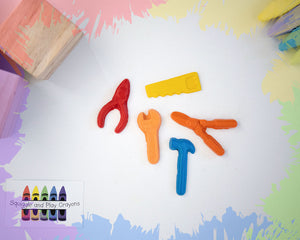 5 crayons in the shape of a saw, a hammer, a wrench, some pliers, and some pruners